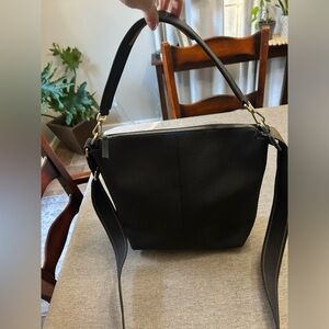 Rothy’s Mini zip bucket bag. Like new.